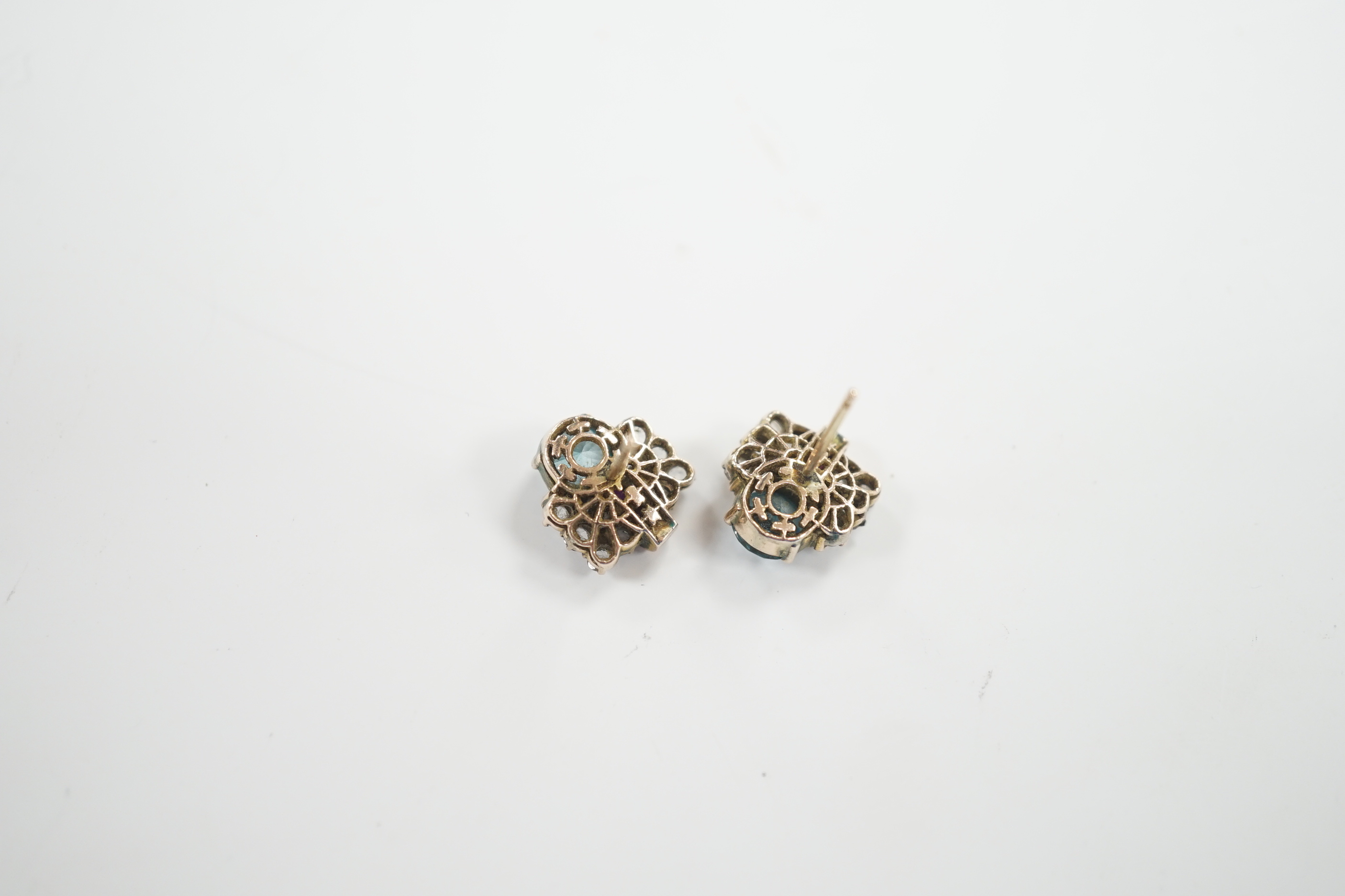 A pair of Art Deco yellow metal, blue zircon and two colour paste set cluster ear studs, 11mm, gross weight 4 grams.